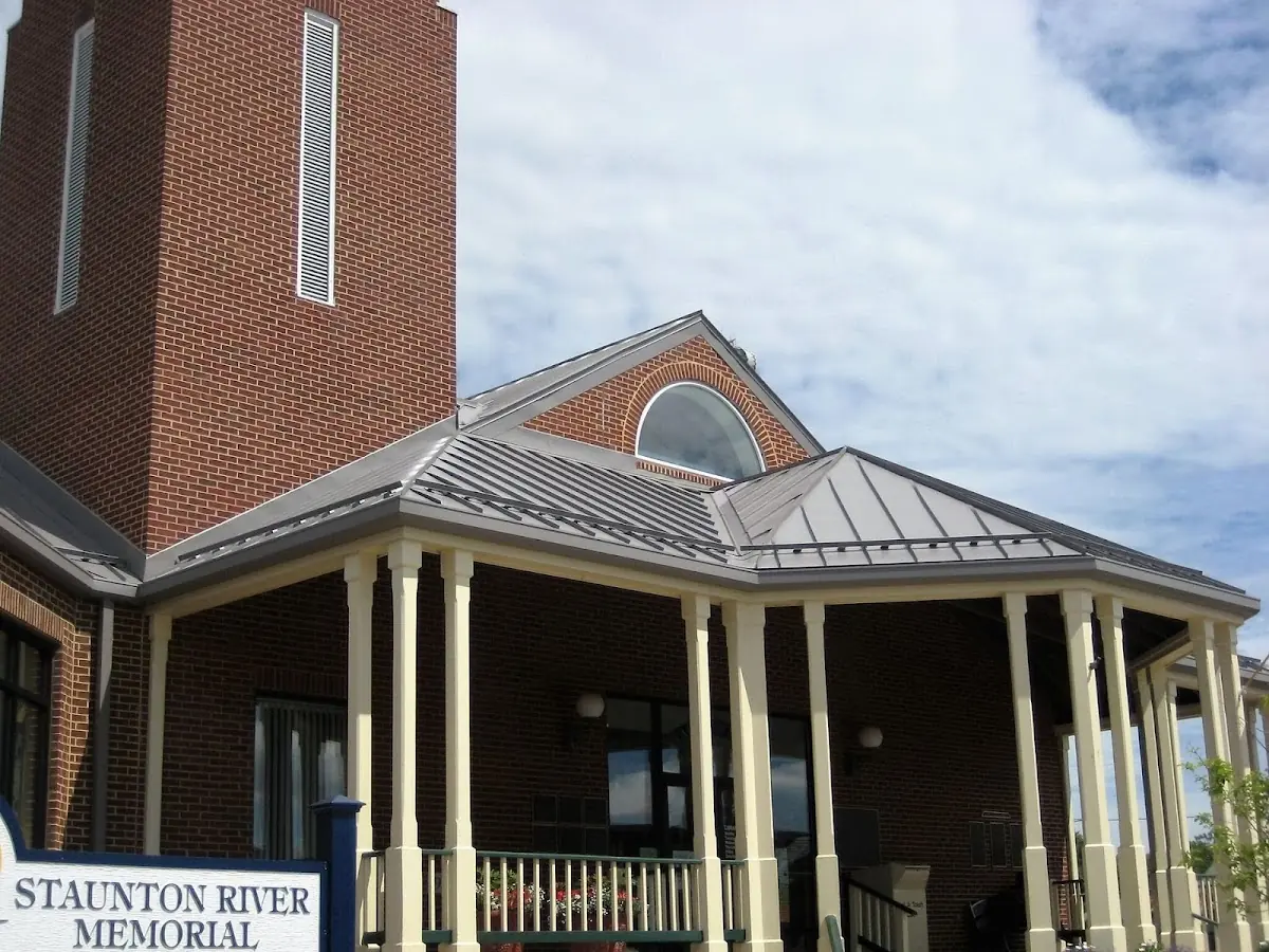 Skilled roofing craftsmen working on a residential roof in Cape May Point